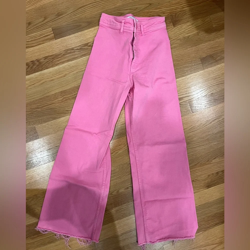 Pink wide leg jeans. Very good condition.